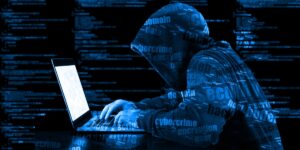 Cyber criminal hacking on a computer